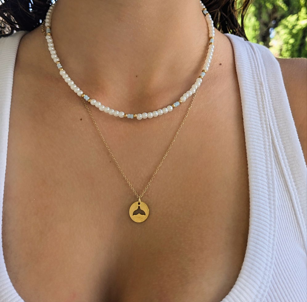 34 שרשרת פנינים